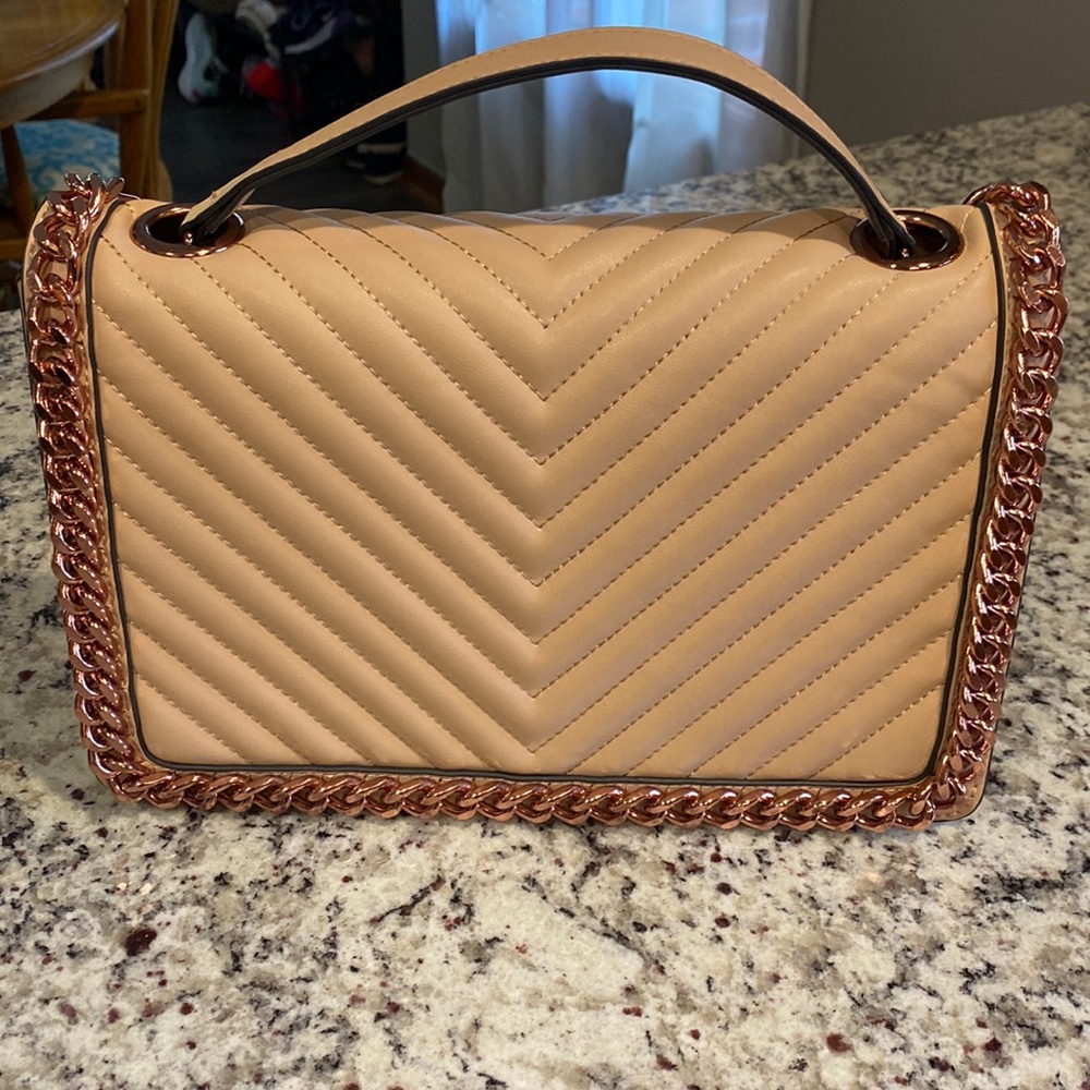 Aldo leather purse. salmon color with copper chain strap.